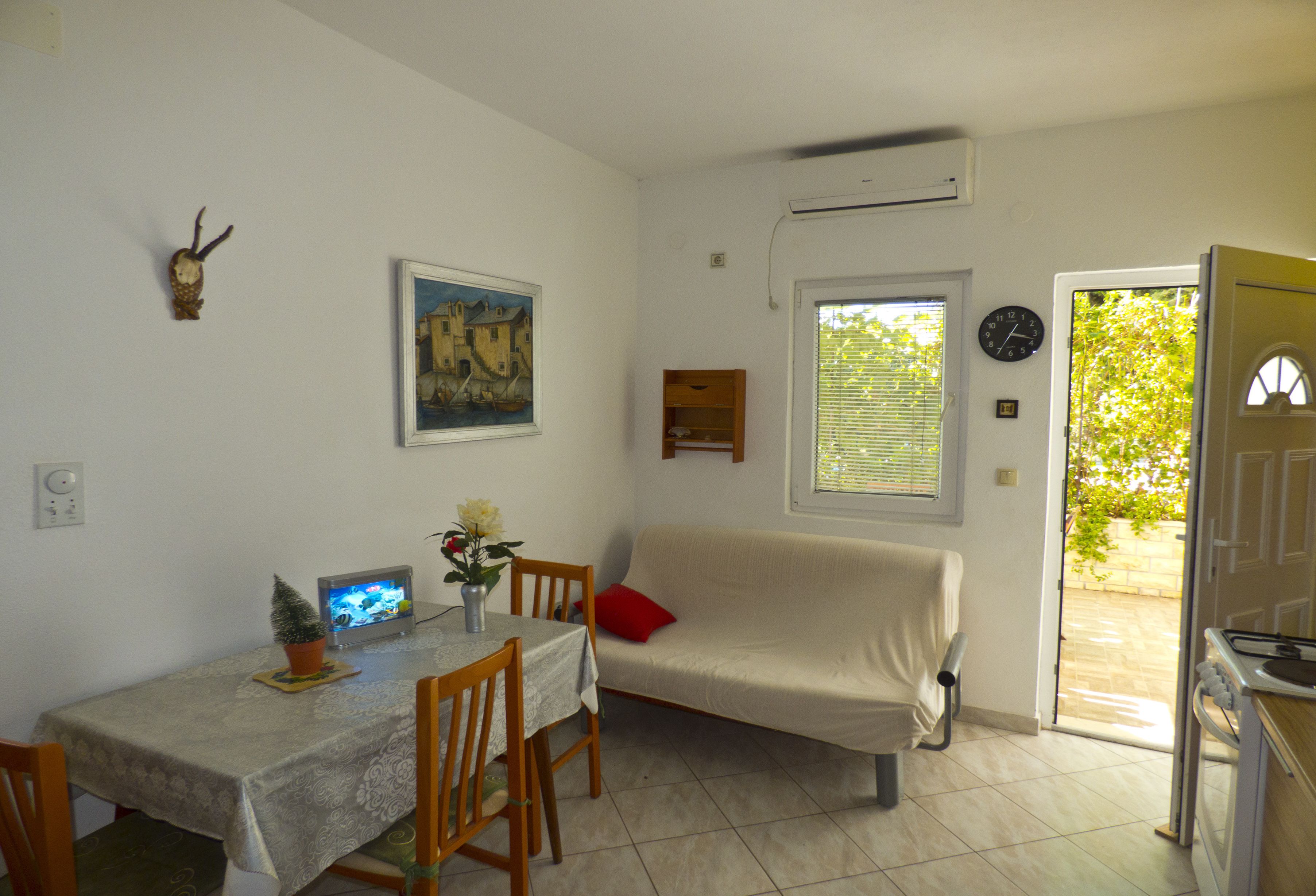 Apartment, 2 Bedrooms, Sea View (A2) | Living area | Flat-screen TV