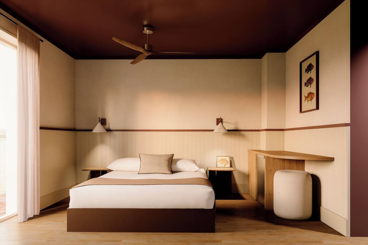 Chambre Double ou avec lits jumeaux, vue partielle sur la mer | Coffres-forts dans les chambres, bureau, lits bébé (gratuits)