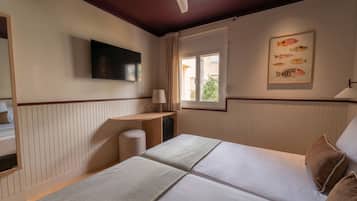 Habitación doble | Caja fuerte, escritorio, cunas gratuitas y wifi gratis