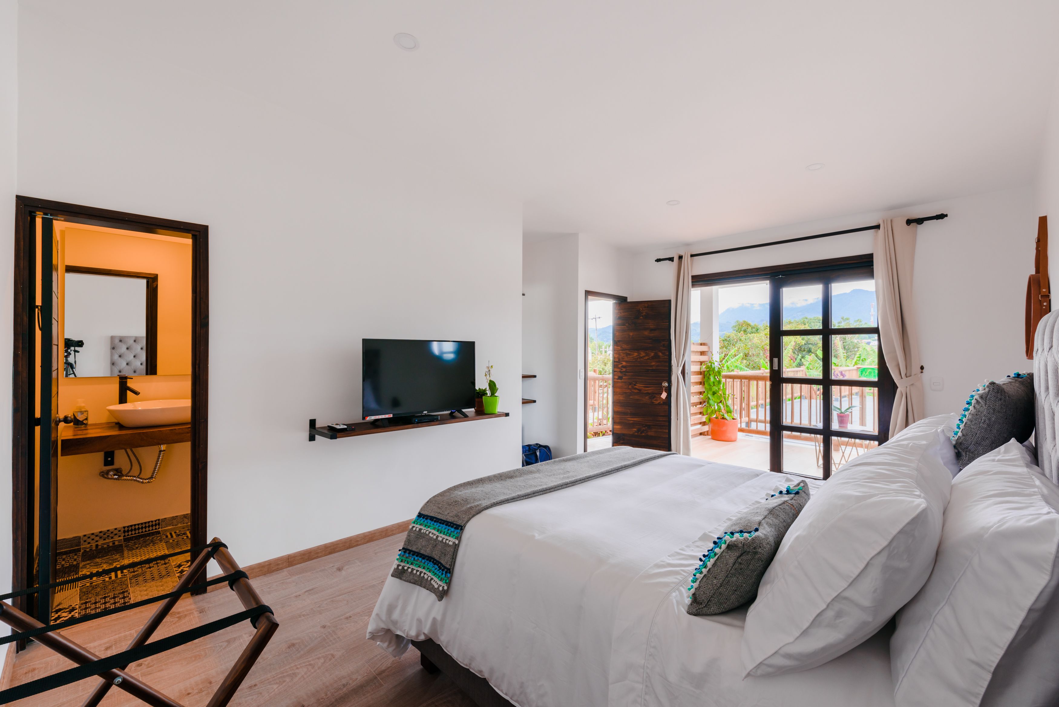 deluxe room, 1 queen bed, terrace, mountain view | blackout curtains, soundproofing, free wifi, bed sheets