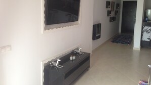 Apartment, 1 Bedroom | Living room | Flat-screen TV - Apartamiento (Asilah)