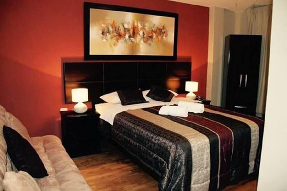 Double Room | Minibar, desk, iron/ironing board, free WiFi