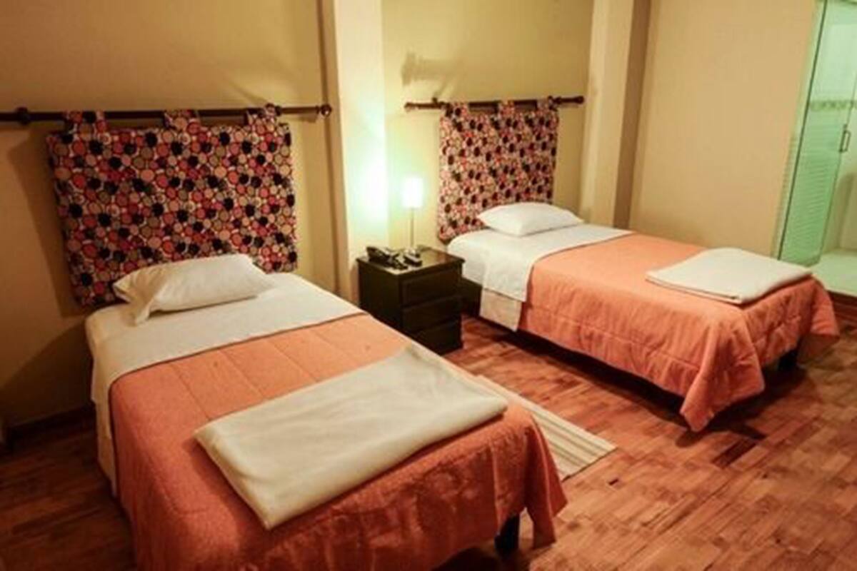 Twin Room | Minibar, desk, iron/ironing board, free WiFi