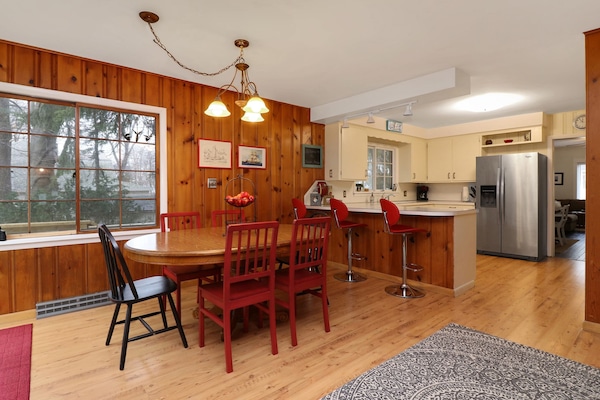 Kitchen table with seating for six guests.