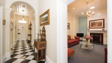 The Pepperberry Town House | Living area | LCD TV, fireplace