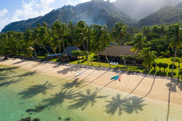 On the beach, sun loungers, beach towels