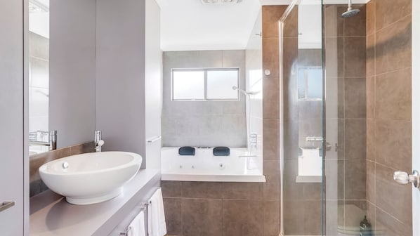 Combined shower/tub, jetted tub, hair dryer