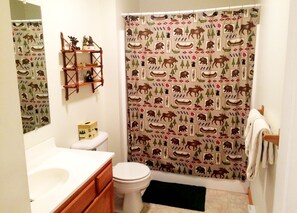 Shower, towels, soap, toilet paper
