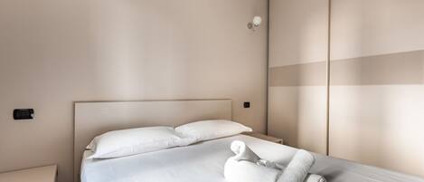 2 dormitorios, tabla de planchar con plancha, wifi y ropa de cama