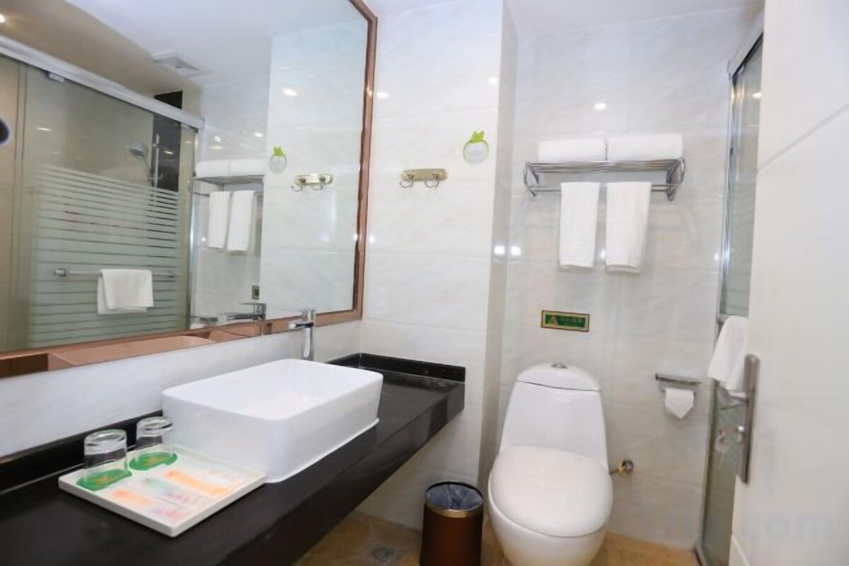 Shower, free toiletries, hair dryer, slippers