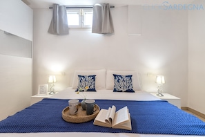 4 bedrooms, desk, iron/ironing board, travel cot