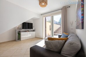 Smart TV, fireplace, table football, books