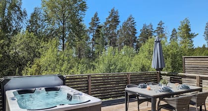 Holiday house NERBJĂRKEN, quiet location, 150m from the lake, bathing jetty, boat, hot tub.