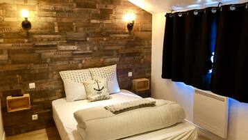 1 slaapkamer, een strijkplank/strijkijzer, wifi, beddengoed