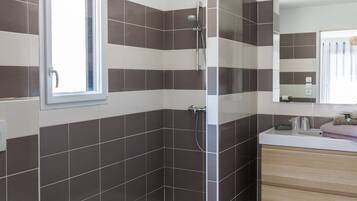 Shower, free toiletries, hair dryer, toilet paper