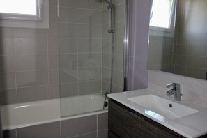 Bathtub, hair dryer