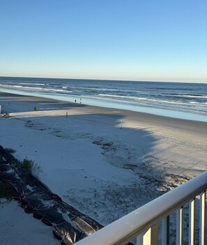 On the beach, sun loungers, beach towels