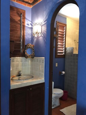 Shower, hair dryer, towels, toilet paper