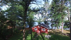 Exterior - Peaceful Vintage 1920's Lakefront Red Log Cabin (Fifty Lakes)