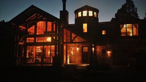 A large, multi-story building with a prominent tower and large windows. - Family, Friends and Festivals! Enjoy Telluride at its Finest! (Telluride)