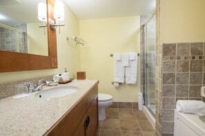 Bathtub, hair dryer, towels