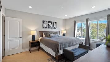 4 bedrooms, memory-foam beds, iron/ironing board, travel cot