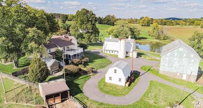 Historic 70-Acre Farm with Porches, Animals & Ponds