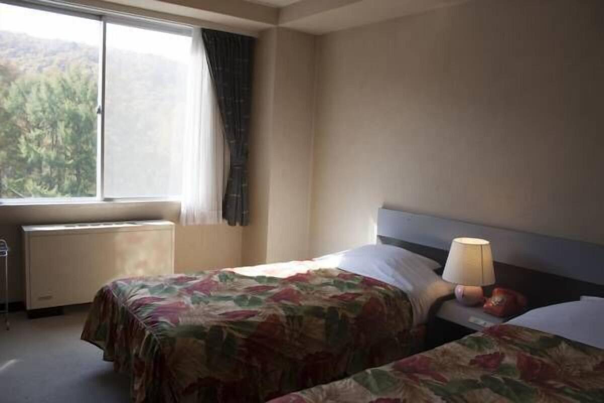 Cofres nos quartos, roupa de cama