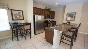 Family Townhome, Private Pool, Garden Area | Shared kitchen | Fridge, microwave, oven, stovetop