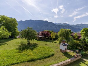 Escape to a serene retreat surrounded by lush gardens and breathtaking mountain views.