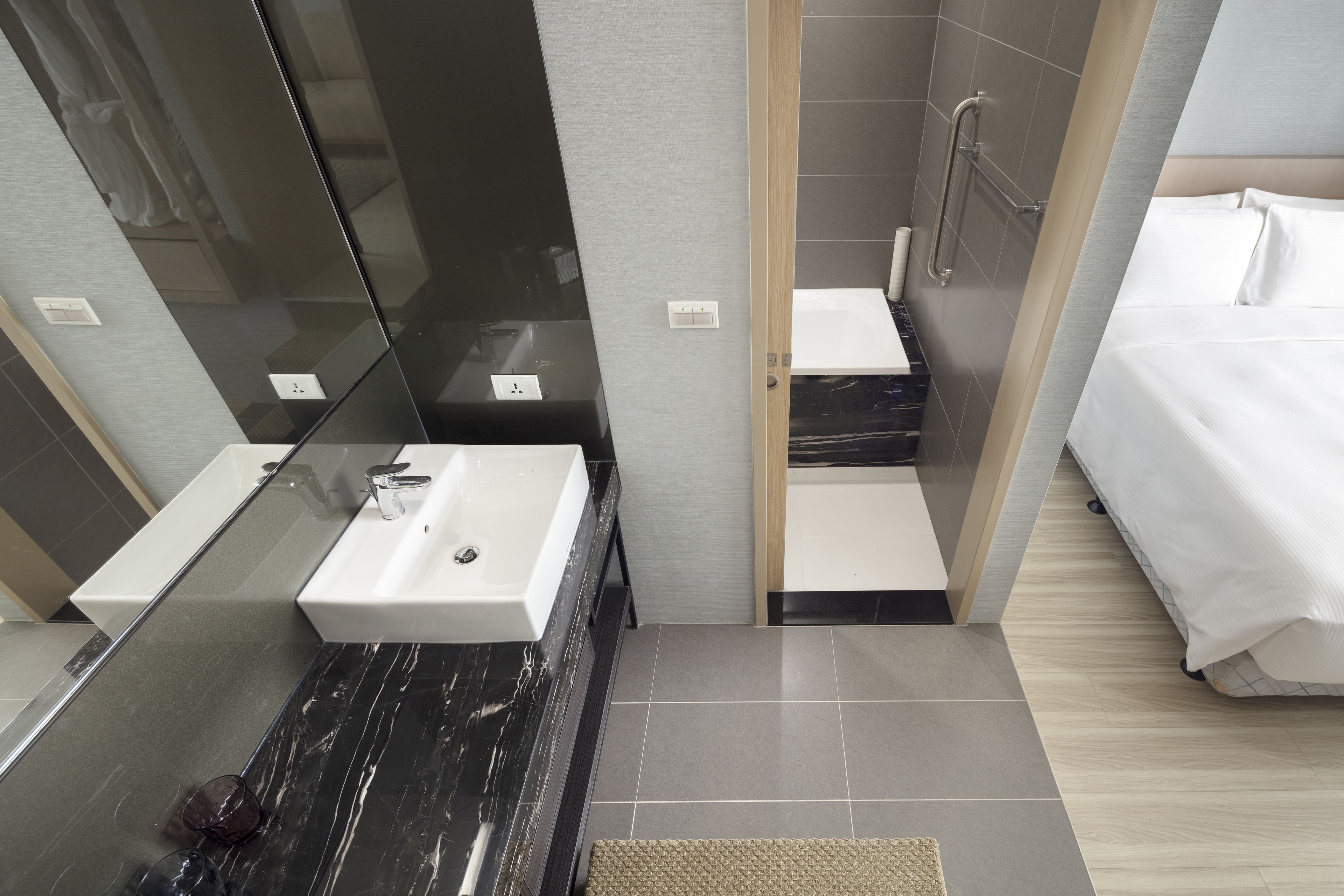 signature suite, 2 bedrooms | bathroom | rainfall showerhead, free toiletries, hair dryer, bathrobes