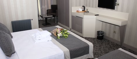 Premium bedding, down duvets, minibar, in-room safe