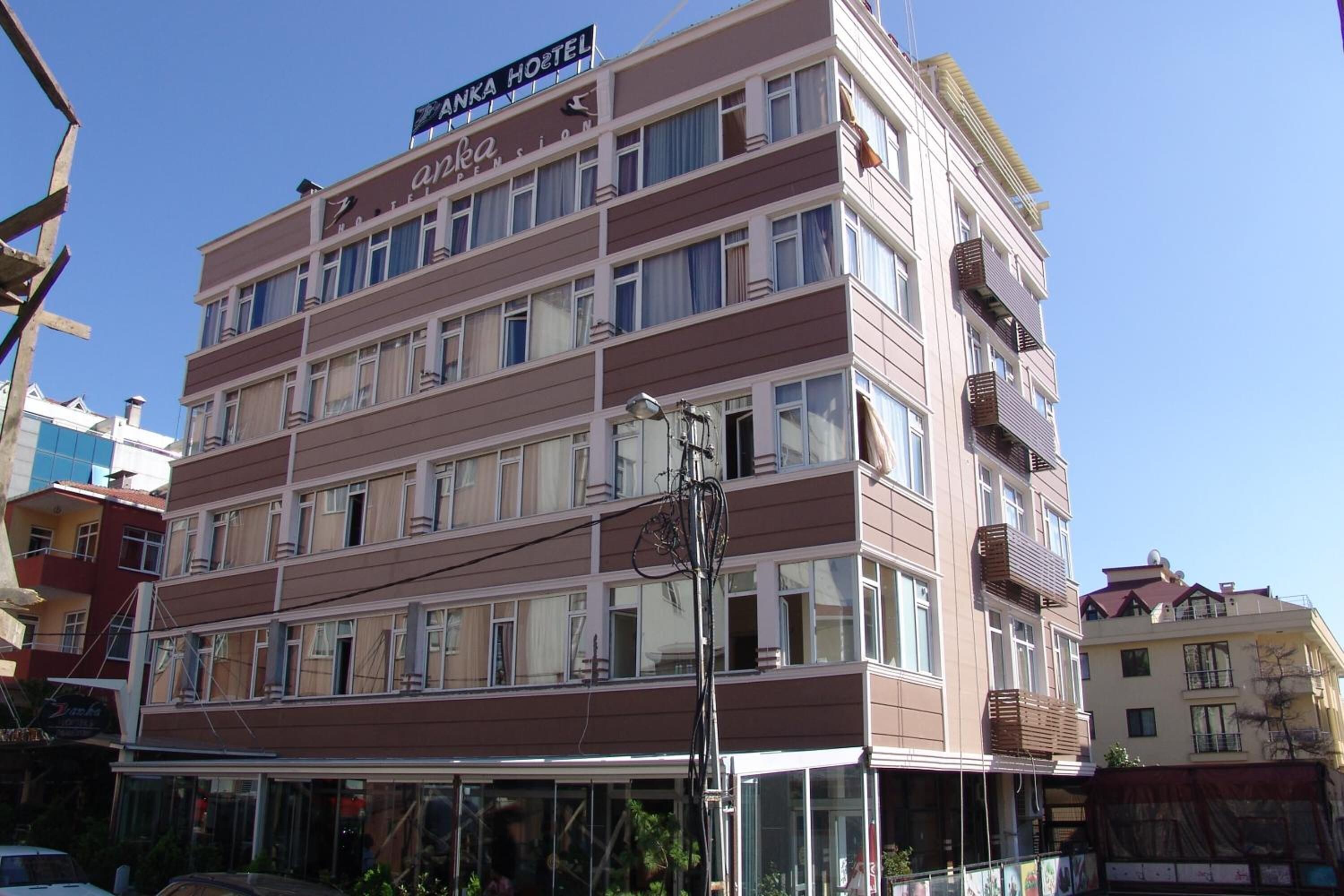 A multi-story building with a sign reading "Banka Hostel."