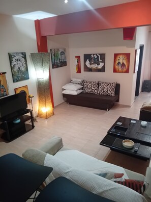 Elite Duplex | Living area | Plasma TV