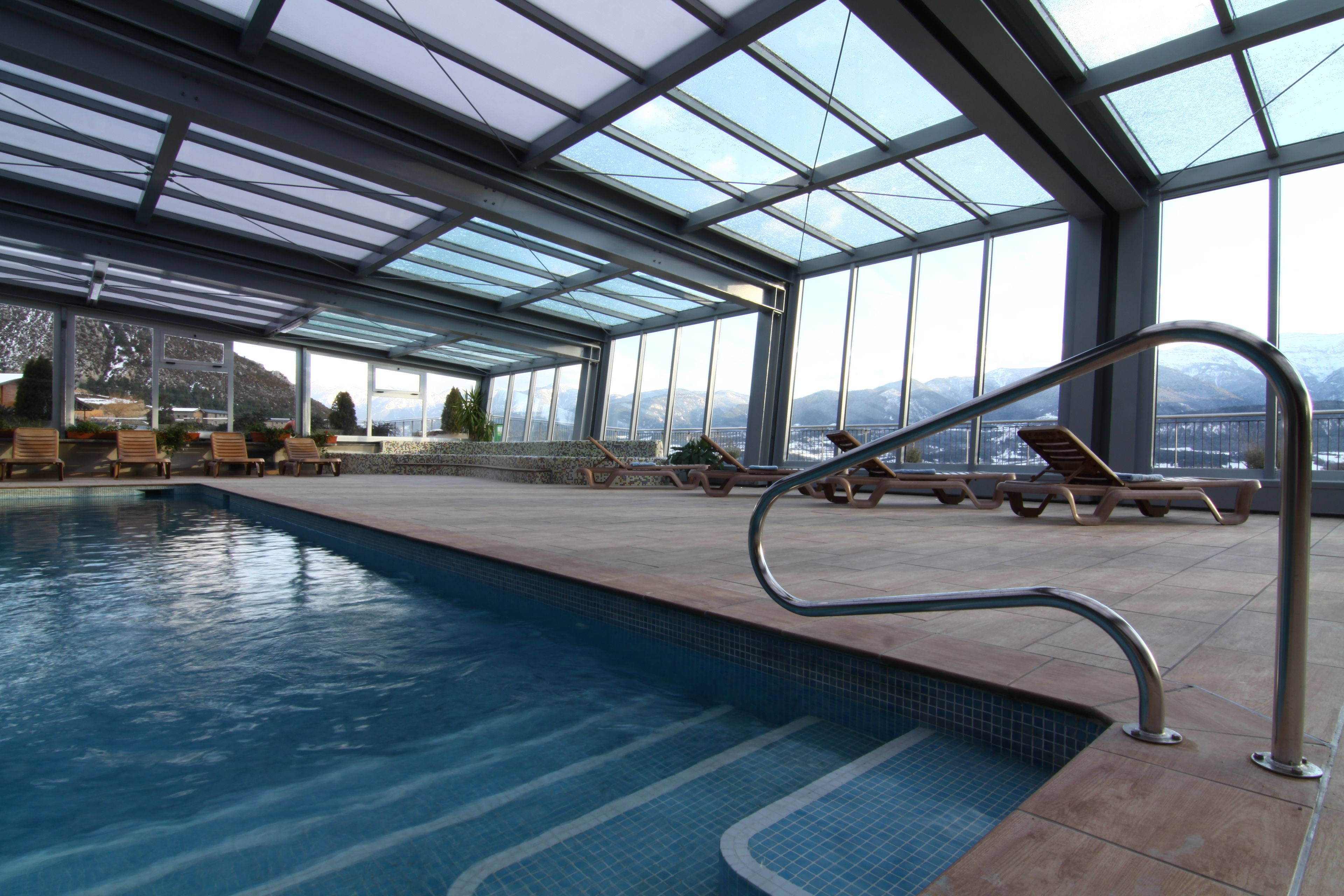 indoor pool, outdoor pool, pool loungers