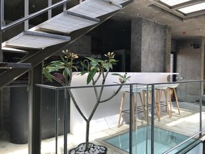 Seasonal outdoor pool, open 7 AM to 9 PM, pool loungers