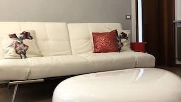 Loft | Área de sala de estar | Televisión de pantalla plana