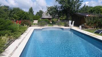 Outdoor pool, pool umbrellas, pool loungers