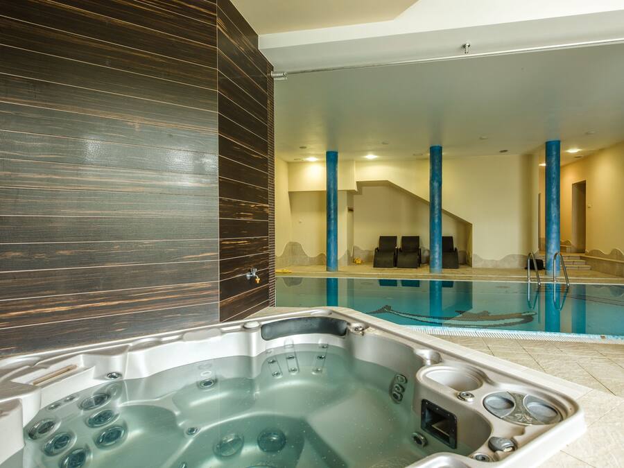 Indoor pool, open 8 AM to 10 PM, pool loungers