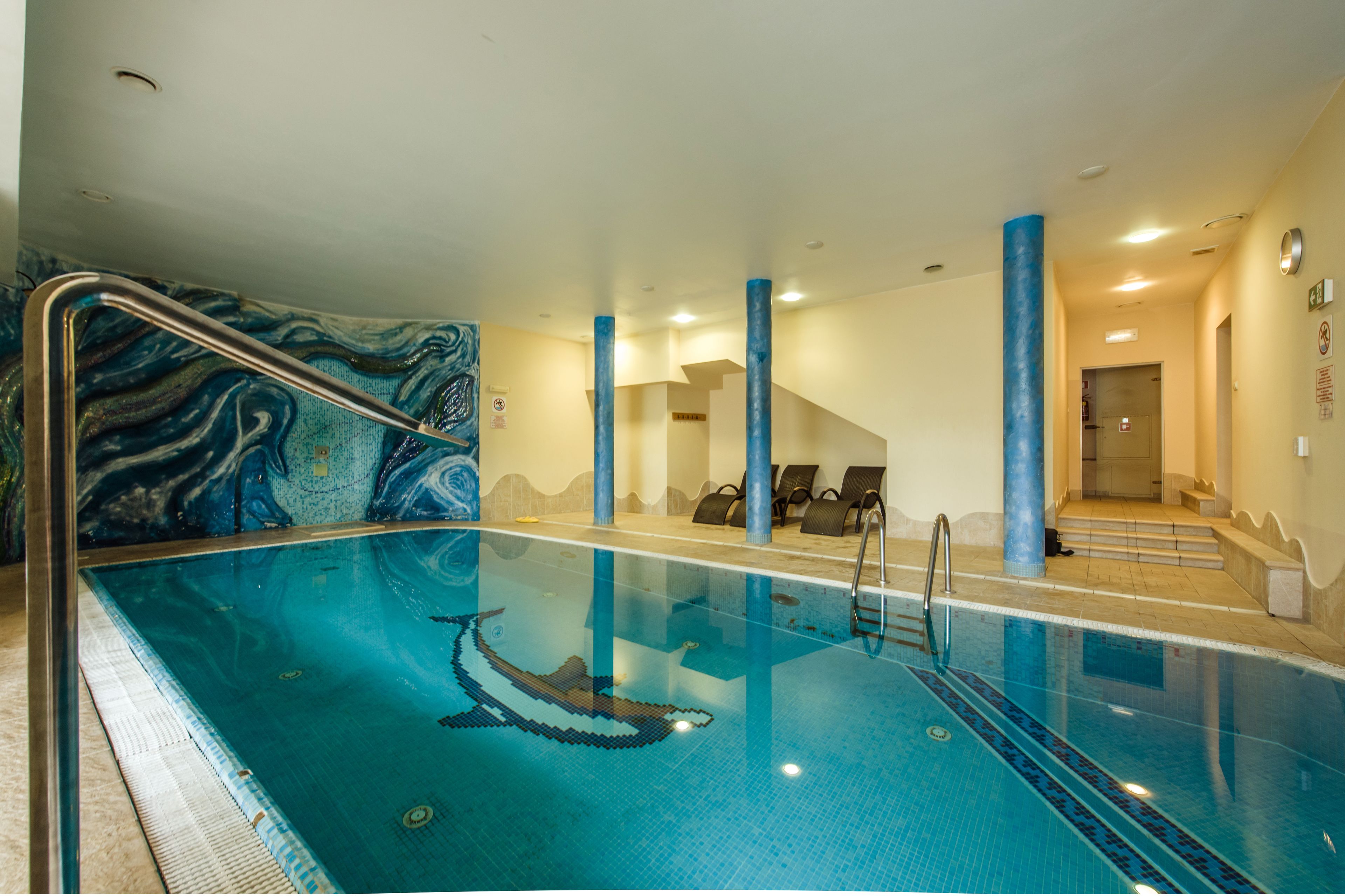 indoor pool, open 8 am to 10 pm, pool loungers