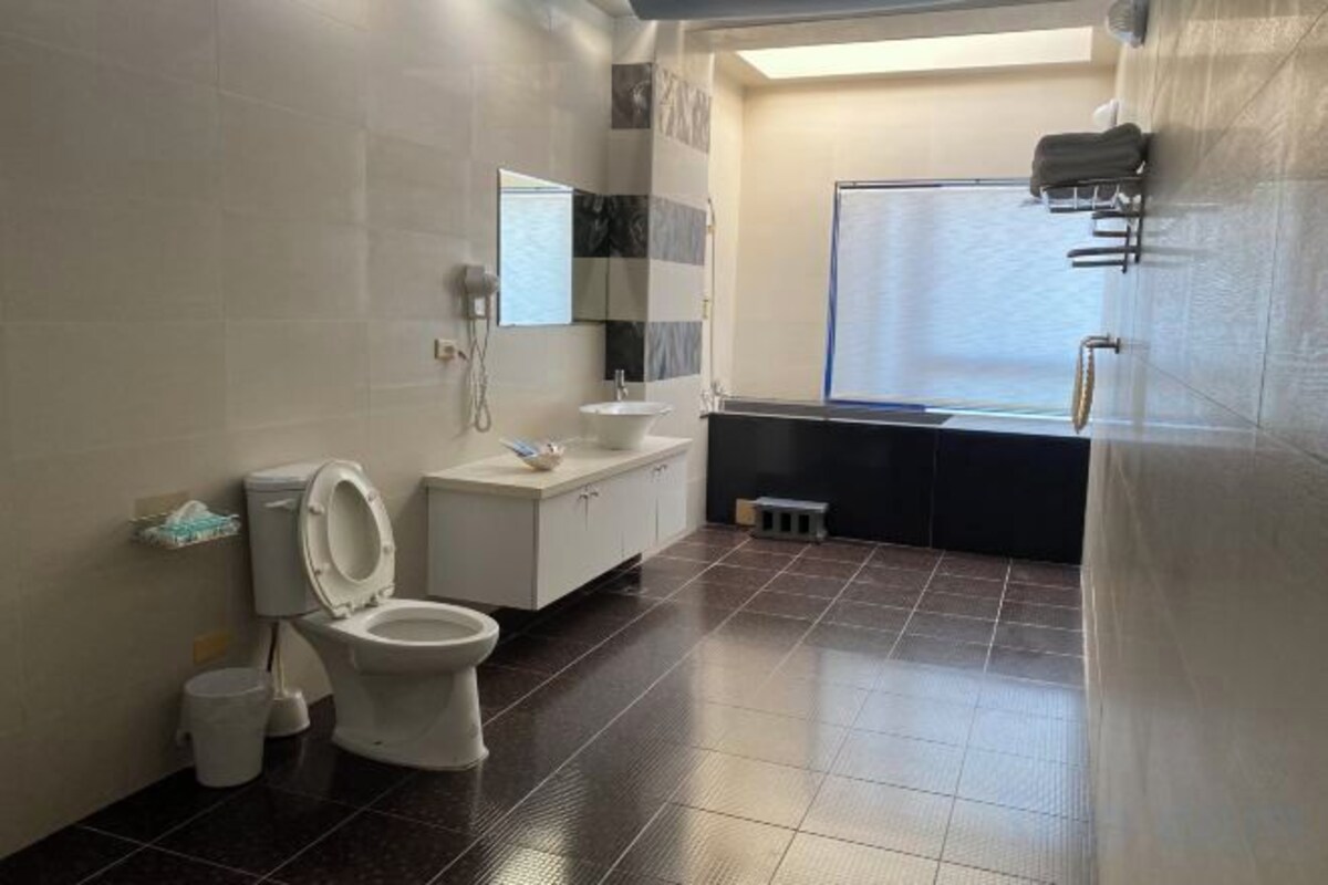Bathroom | Shower, rainfall showerhead, hair dryer, slippers