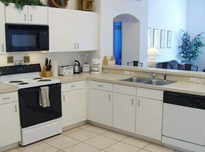 Family Villa, Garden Area | Shared kitchen