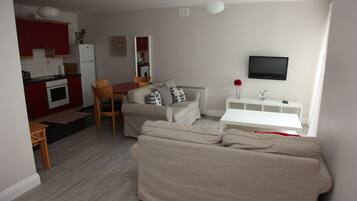 Deluxe Apartment, Multiple Beds, Non Smoking | Living area