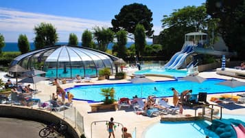 Indoor pool, seasonal outdoor pool, pool umbrellas, pool loungers