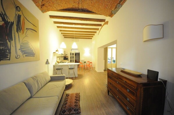 Apartment, 1 Bedroom | Living room | Flat-screen TV