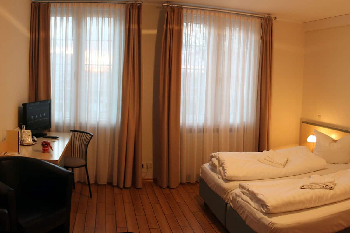 triple room | hypo-allergenic bedding, desk, blackout curtains, soundproofing