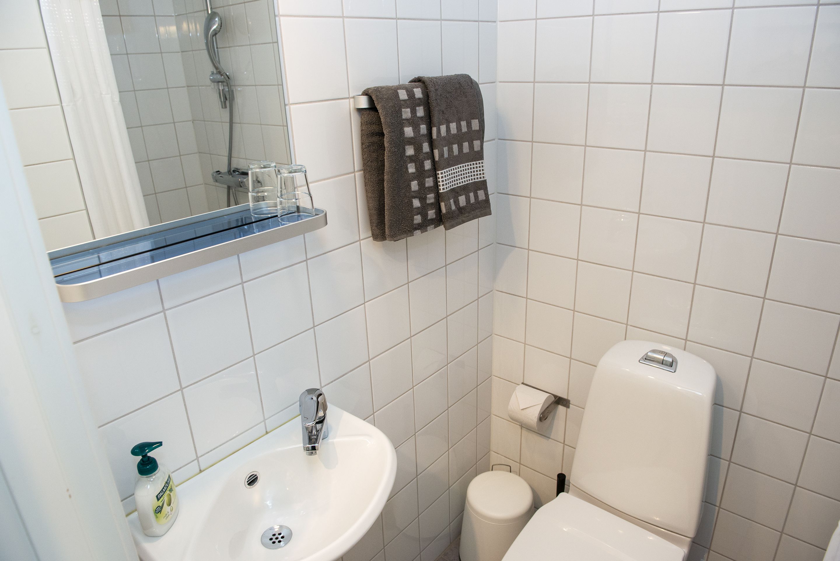 single room | bathroom | shower, hair dryer, towels, soap