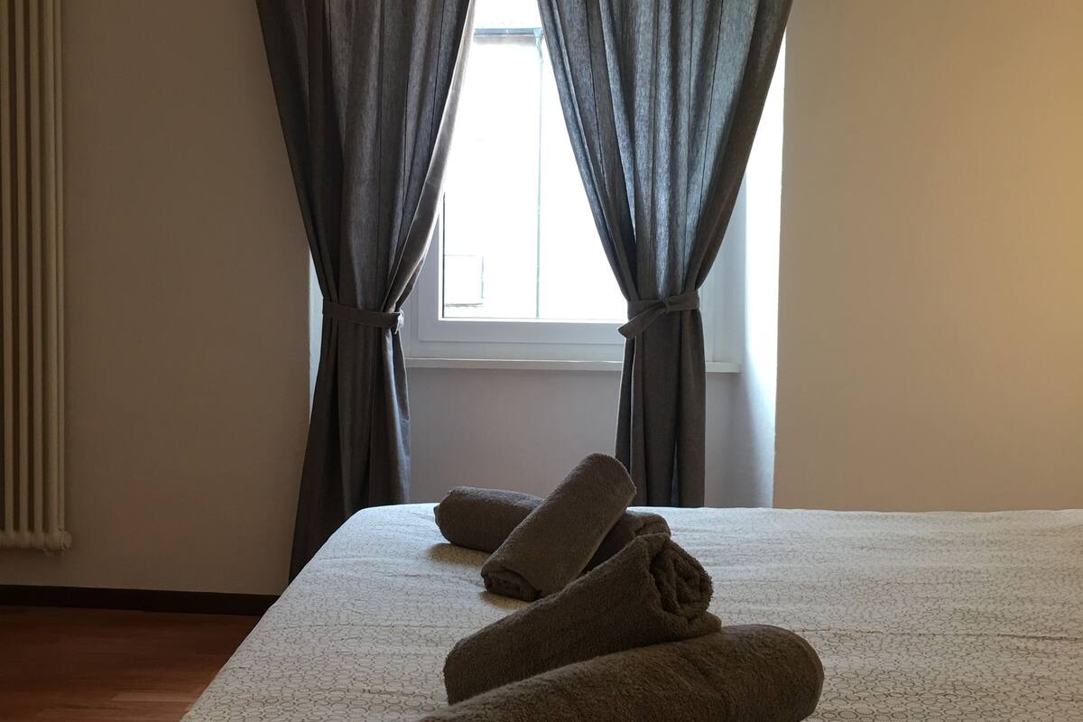 premium bedding, down duvets, desk, blackout curtains