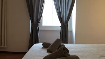 Premium bedding, down comforters, desk, blackout drapes