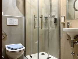 Standard Double Room | Bathroom | Shower, hair dryer, towels